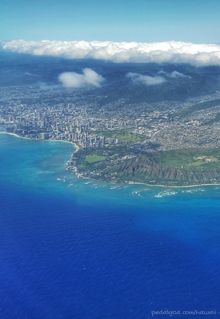 Flying to Honolulu airport on your Hawaii flight. When the Hawaii vacation is on Oahu, make air travel seating part of essentials of things to do for vacation planning along with your Hawaii packing checklist! See the best beaches, hiking, and snorkeling destinations in the USA from above with your Honolulu flight! Make it a part of your bucket list to see Waikiki from the plane as you’re flying into the Hawaii airport on Oahu after a long flight!
